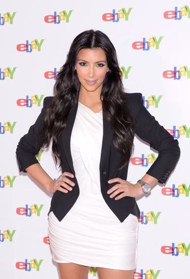 http://celebthumbs.blogspot.com/2009/12/kim-kardashian-sexy-photos-at-ebay.html