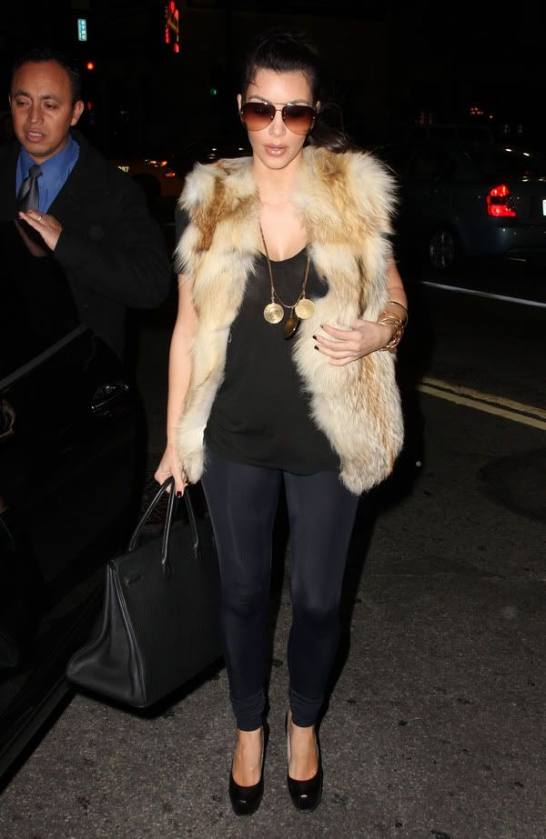 http://celebthumbs.blogspot.com/2010/01/kim-kardashian-out-and-about-in-los.html