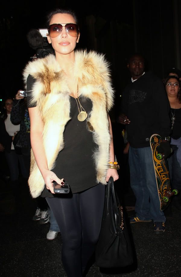 http://celebthumbs.blogspot.com/2010/01/kim-kardashian-out-and-about-in-los.html