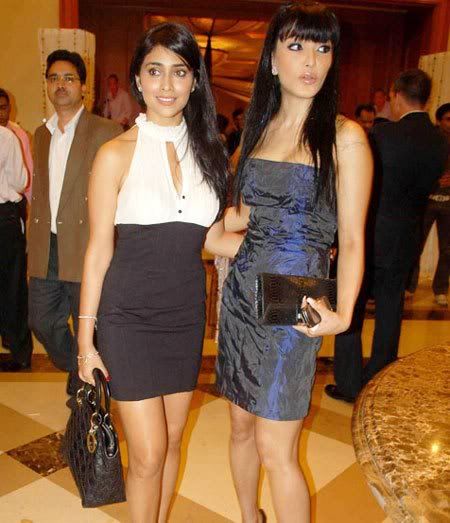 http://celebthumbs.blogspot.com/2009/12/shriya-saran-and-koena-mitra-at-anirudh.html