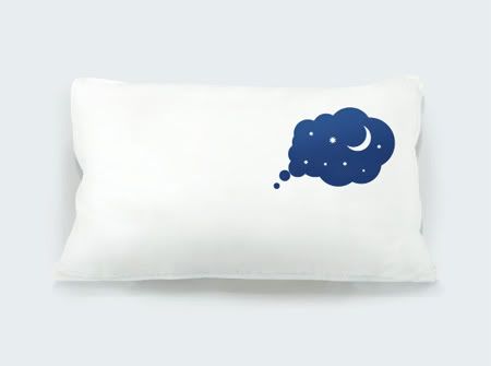 white pillow with dark dream design